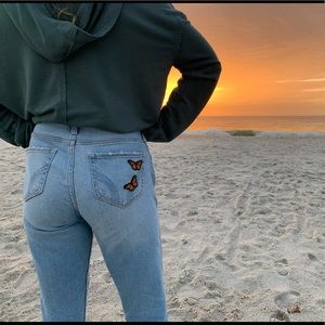 Hollister jeans with butterfly patches